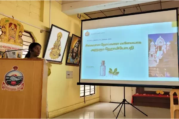 Dr. Nisha presenting about homeopathy as a simple approach to complex diseases